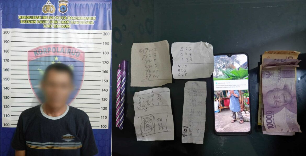 PELAKU TOGEL-Satpolair Polresta Banjarmasin membekuk pelaku judi togel berinisial RA di pesisir sungai.Martapura Jalan Banyiur Luar Kelurahan Basirih Banjarmaain Barat, Senin (22/5/2023) siang. (foto:ist)