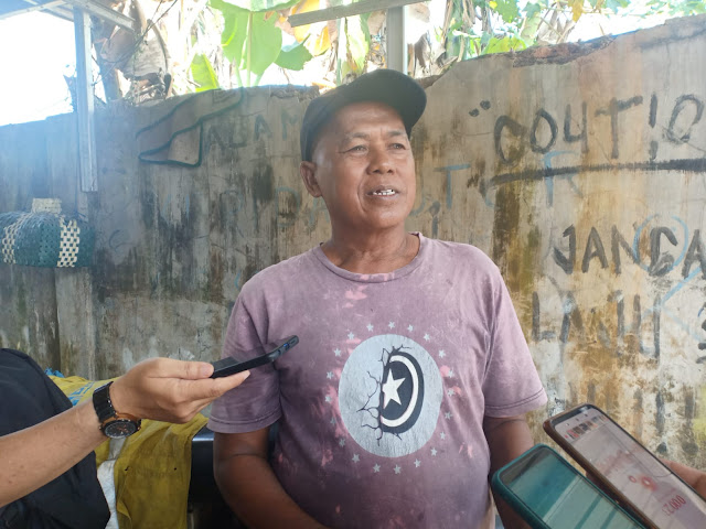 Ketua RT 30 H Wagimin Jalan Telaga Intan Kelurahan Telaga Biru