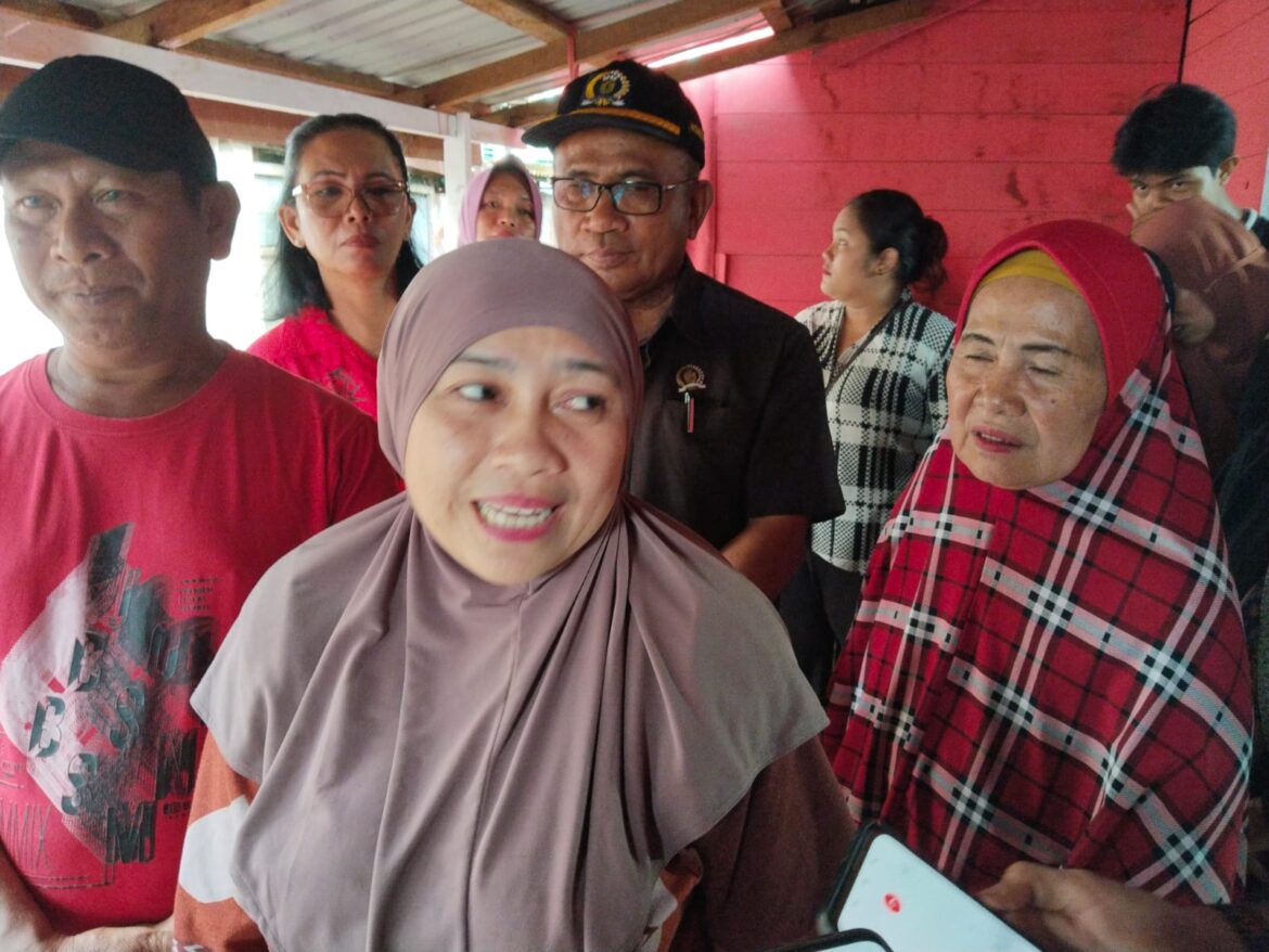 Ketua RT 10 Sarwo Suprayogidan Istri Bersama Anggota DPRD Saut Nathan Samosir